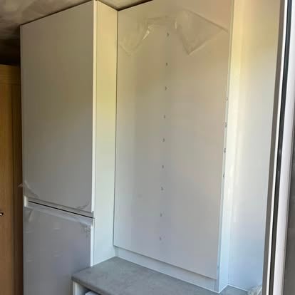 Fitted white wardrobe and storage unit