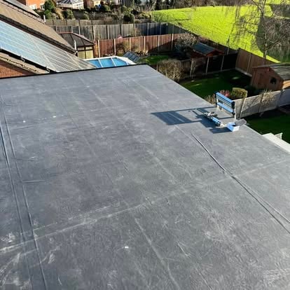 Large completed EPDM roof with skylight