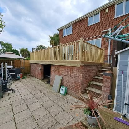 Elevated timber deck with balustrades and steps
