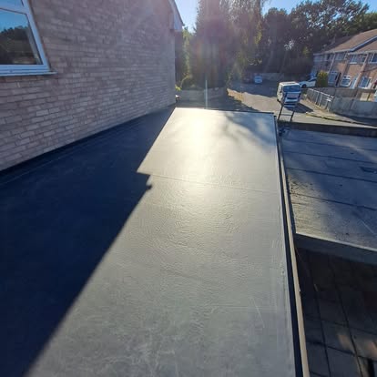 Completed EPDM flat roof on house extension