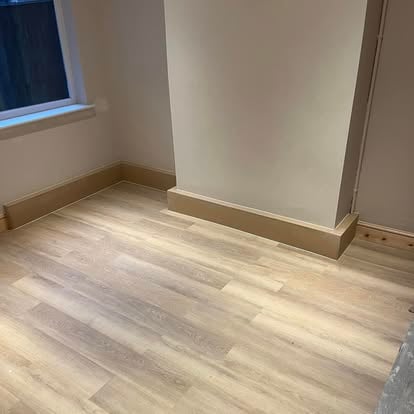 Light oak flooring with skirting boards