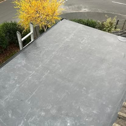 Completed EPDM roof residential autumn street