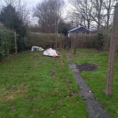 Garden site being prepared with survey pegs