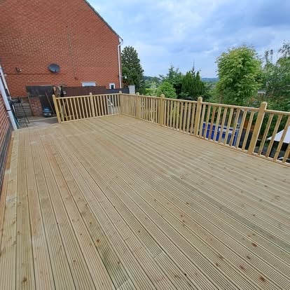 Large elevated timber deck with spindle balustrades
