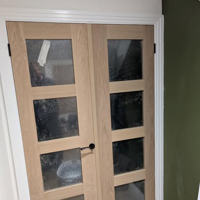 New oak glazed double interior doors fitted in hallway