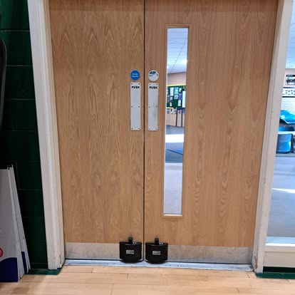 Commercial oak double doors fitted basketball court visible
