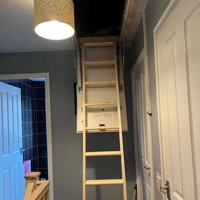 Loft ladder installed in ceiling hatch