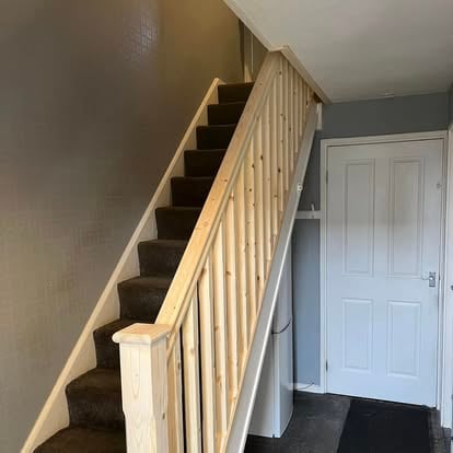 Completed pine staircase with balustrade