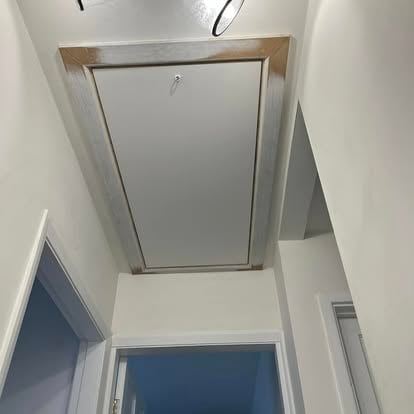 New loft access hatch with timber border