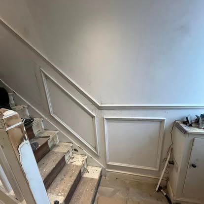 Staircase wall panelling installation in progress
