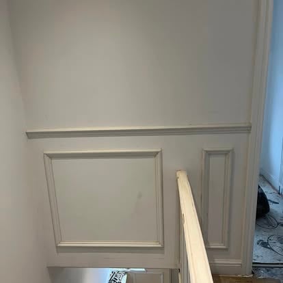 Staircase wall panelling with MDF panel frames