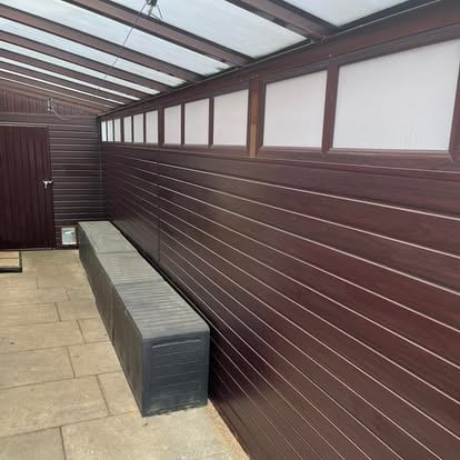 Dark brown lean-to interior with composite cladding