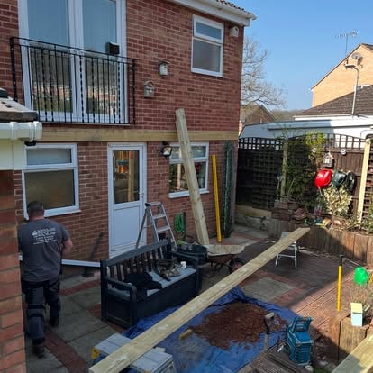 Completed timber pergola with decking in back garden