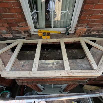 New timber frame and joists built for bay window roof