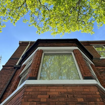 Victorian terrace bay window completed with new white UPVC fascia