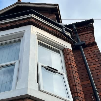 Victorian bay window UPVC soffit and guttering detail