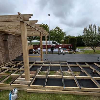 Composite deck and pergola frame under construction