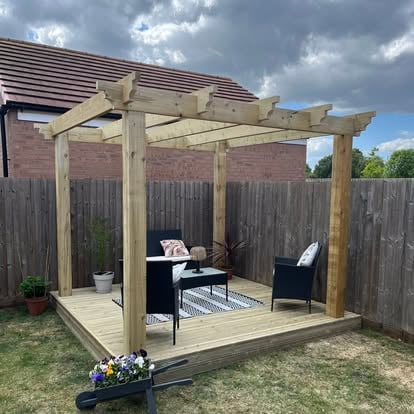 Timber decking and pergola at new build house