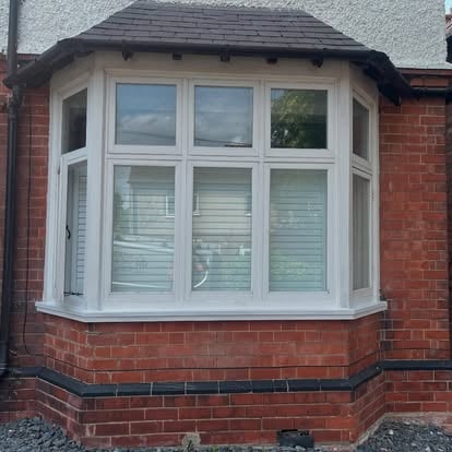 New UPVC bay window installed front exterior