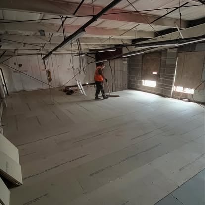 Large commercial space with new floor substrate laid