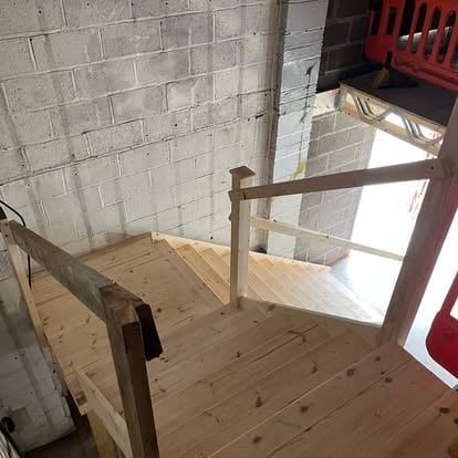 New pine staircase interior view from below