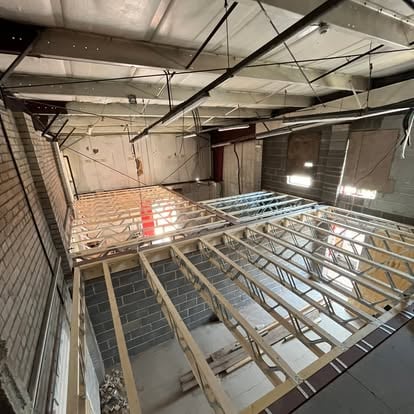Commercial space elevated timber floor frame from above