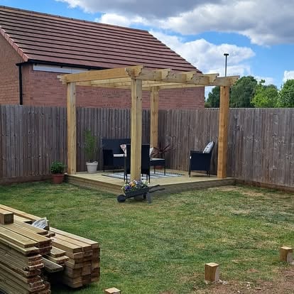 Pergola and timber decking in garden