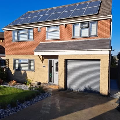 Completed canopy porch with solar panels on roof