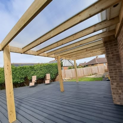Composite decking under polycarbonate timber pergola