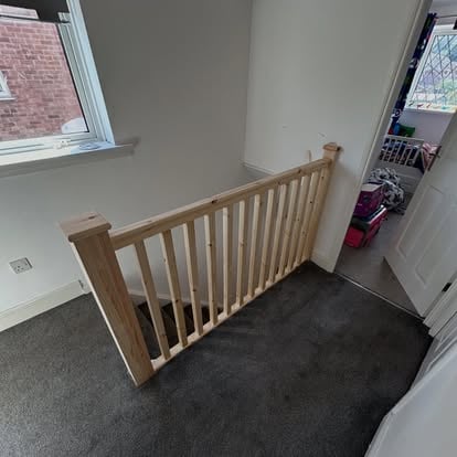 New pine staircase balustrade at landing top