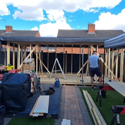 Garden room timber frame being erected