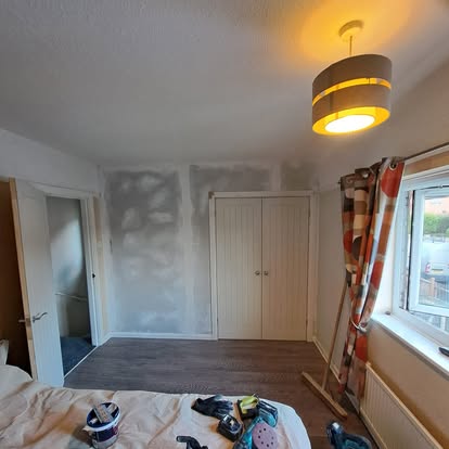Bedroom being replastered with built-in wardrobe