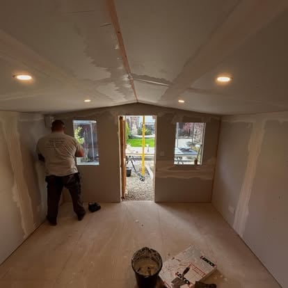Garden room interior at plasterboarding stage
