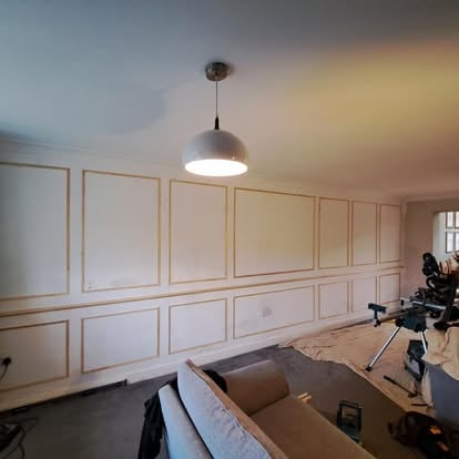 Living room wall panelling in progress, wide view