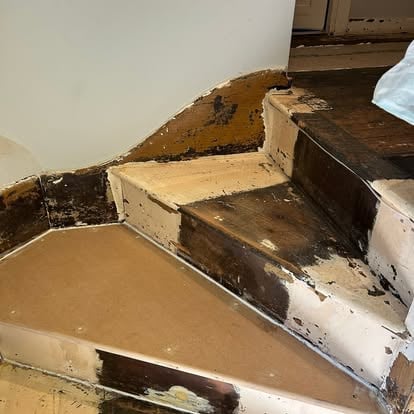 Utility room before fit-out, patterned tiles and boiler