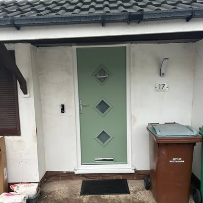 New sage green composite front door at number 17