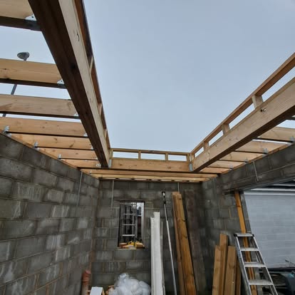 Breeze block extension walls with timber roof rafters