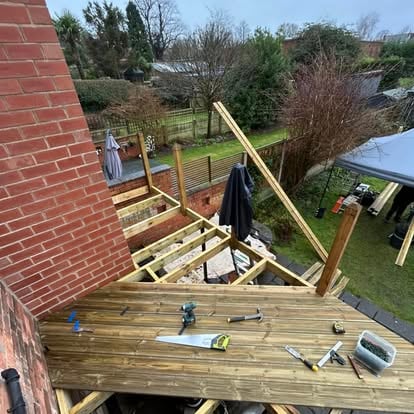 Ground-level decking alongside terraced house