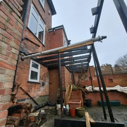 Old canopy structure before elevated deck, side view